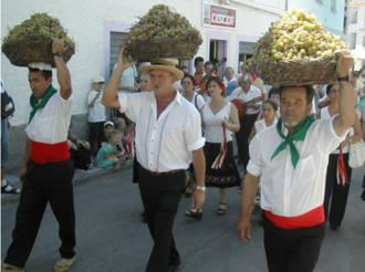 Wine growers celebrating Competa's Spanish annual wine festival.